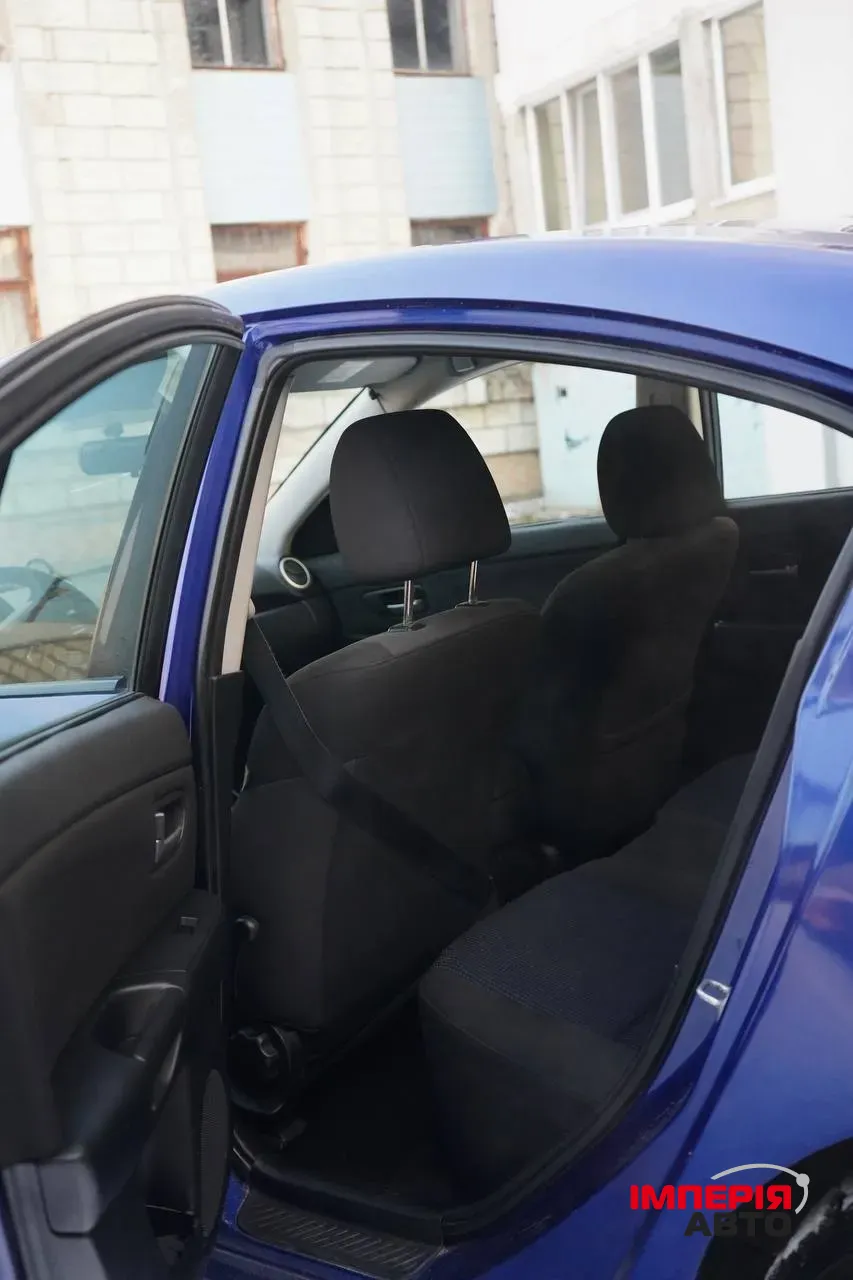 Mazda 3 - фото 7