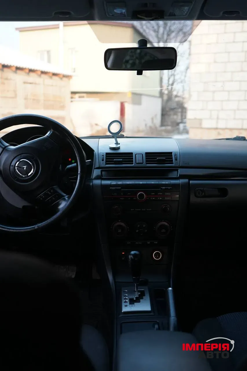 Mazda 3 - фото 11