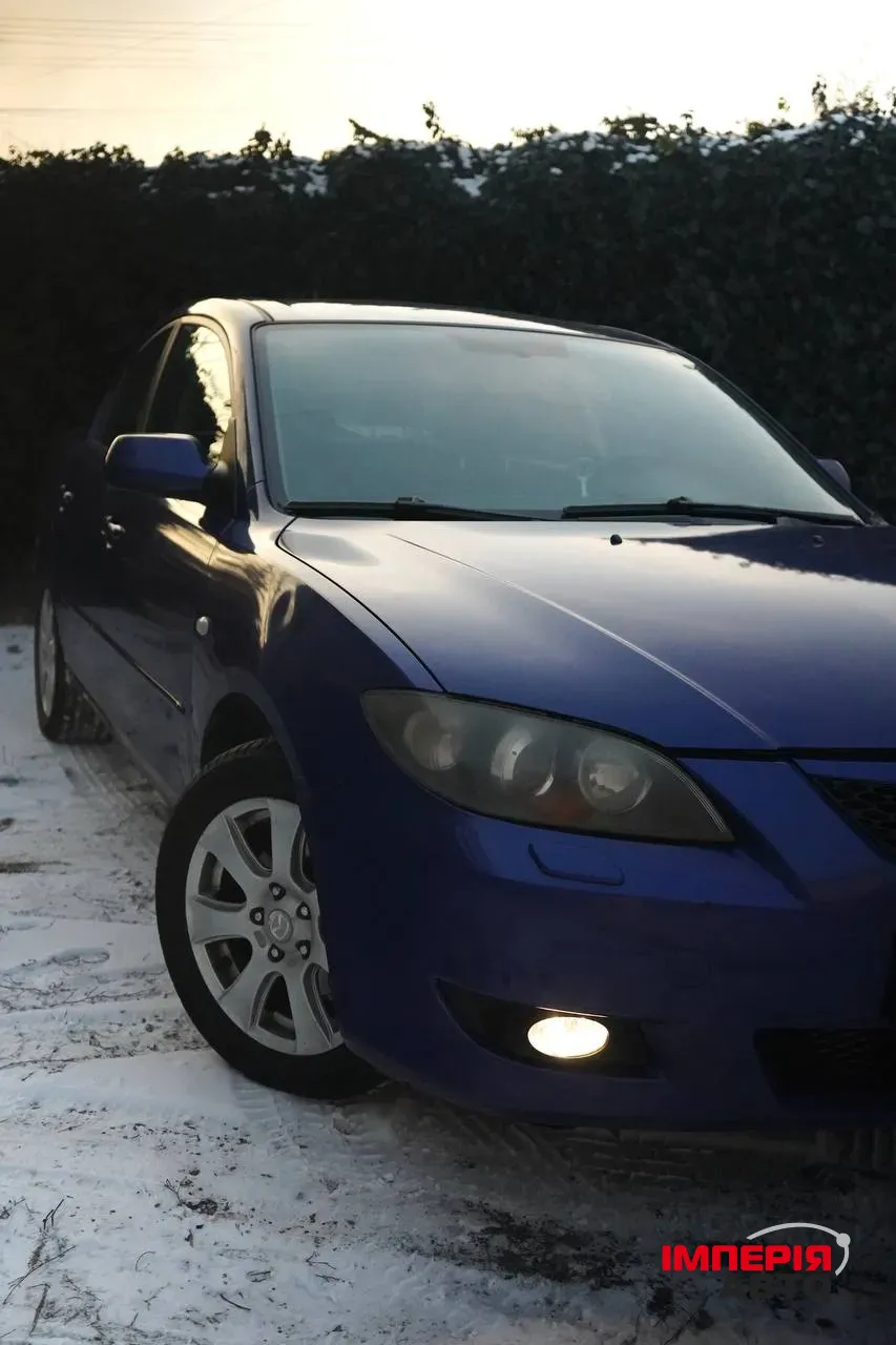 Mazda 3 - фото 4
