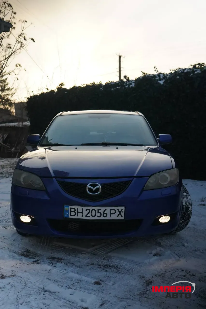 Mazda 3 - фото 2