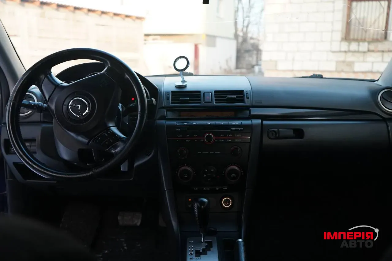 Mazda 3 - фото 10