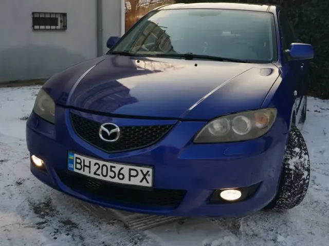 Mazda 3 - фото 1