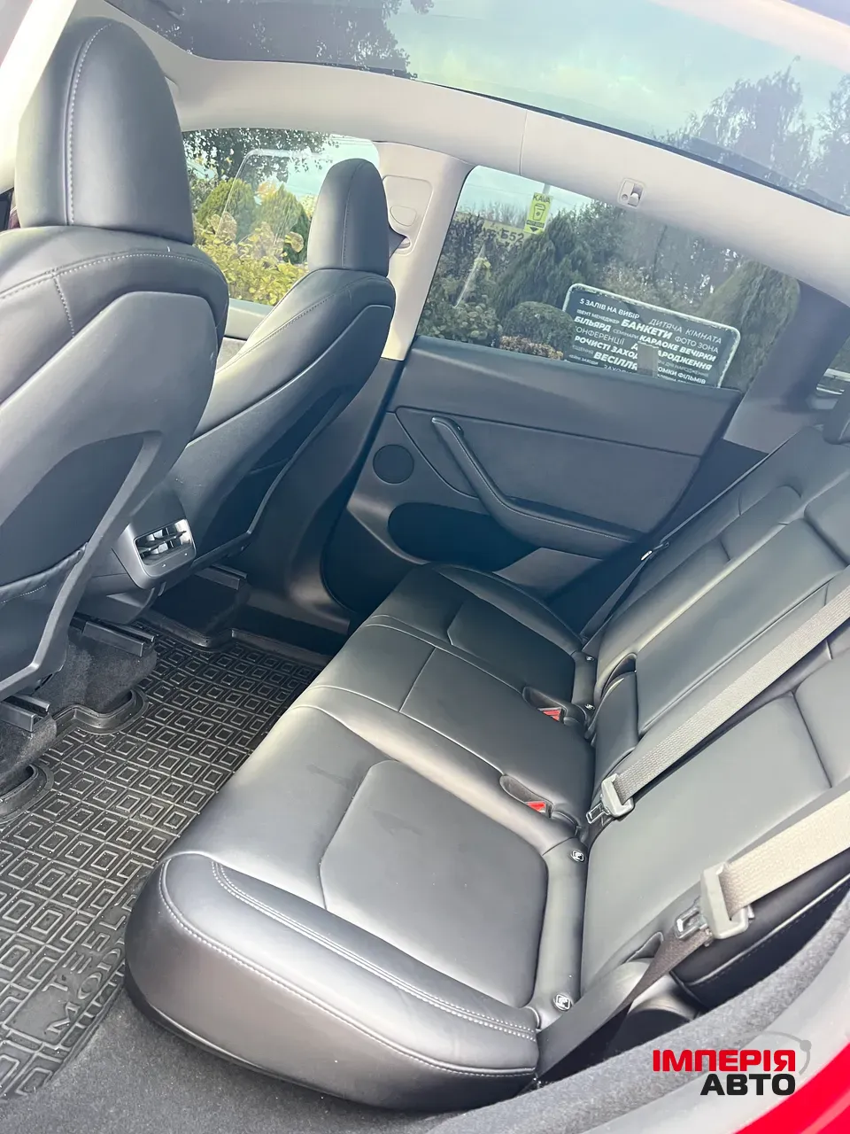 Tesla Model Y - фото 25