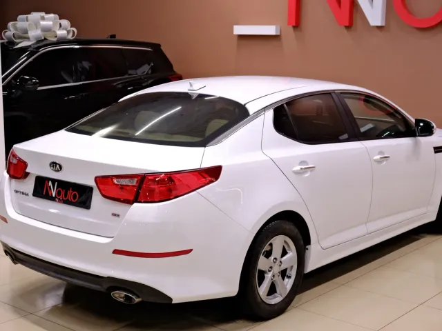 Kia Optima - фото 5