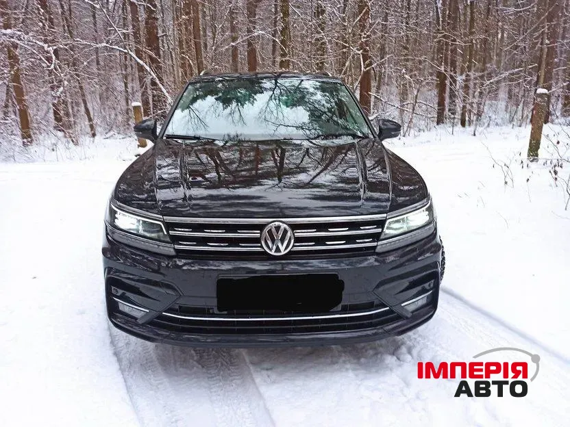 Volkswagen Tiguan - фото 1