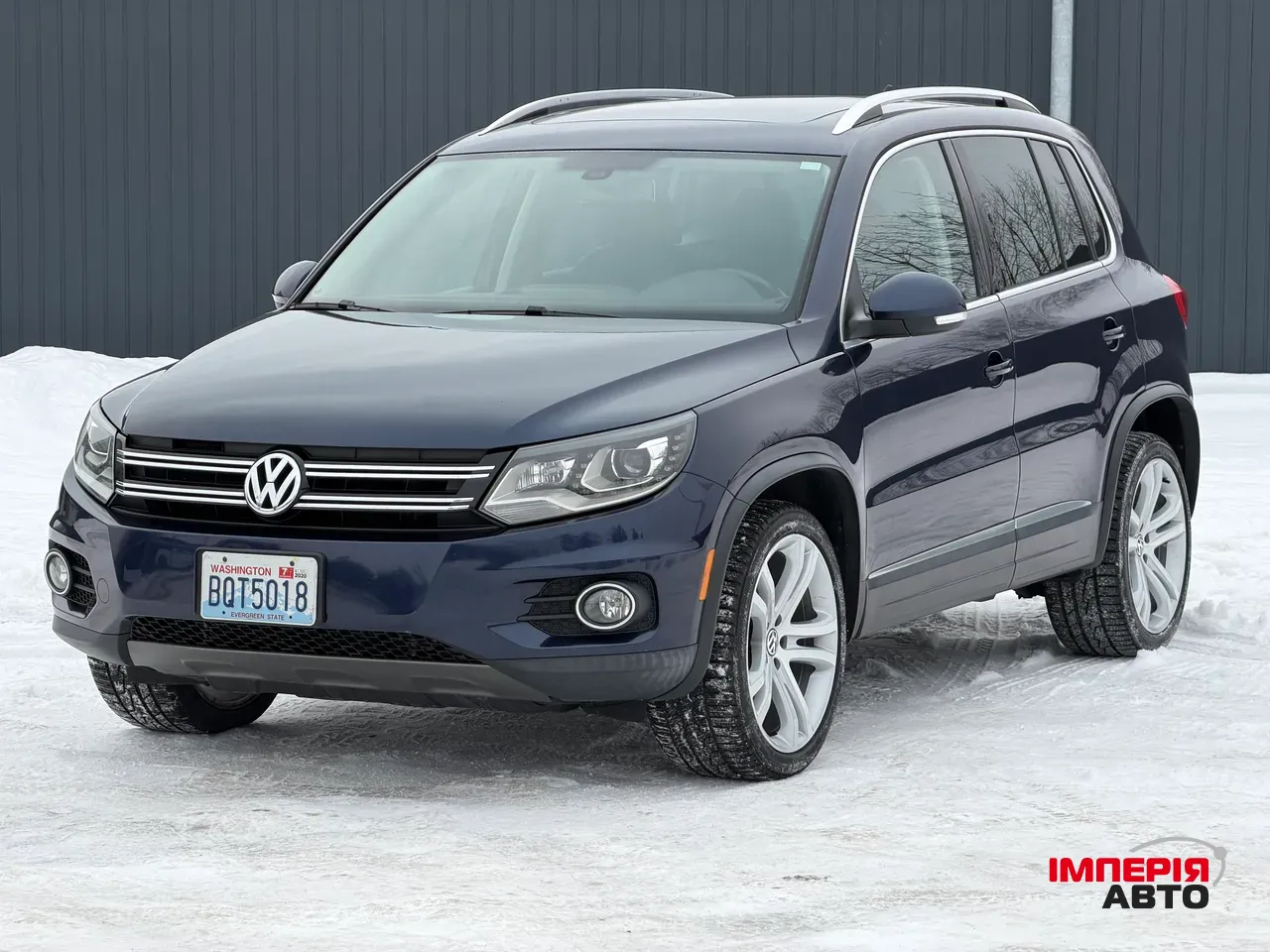 Volkswagen Tiguan - фото 1