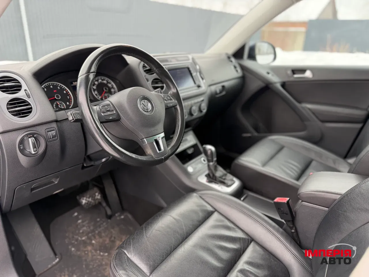 Volkswagen Tiguan - фото 7