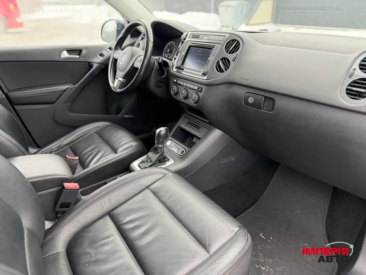 Volkswagen Tiguan - фото 8