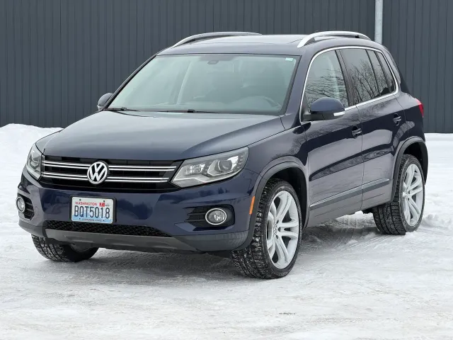 Volkswagen Tiguan - фото 1