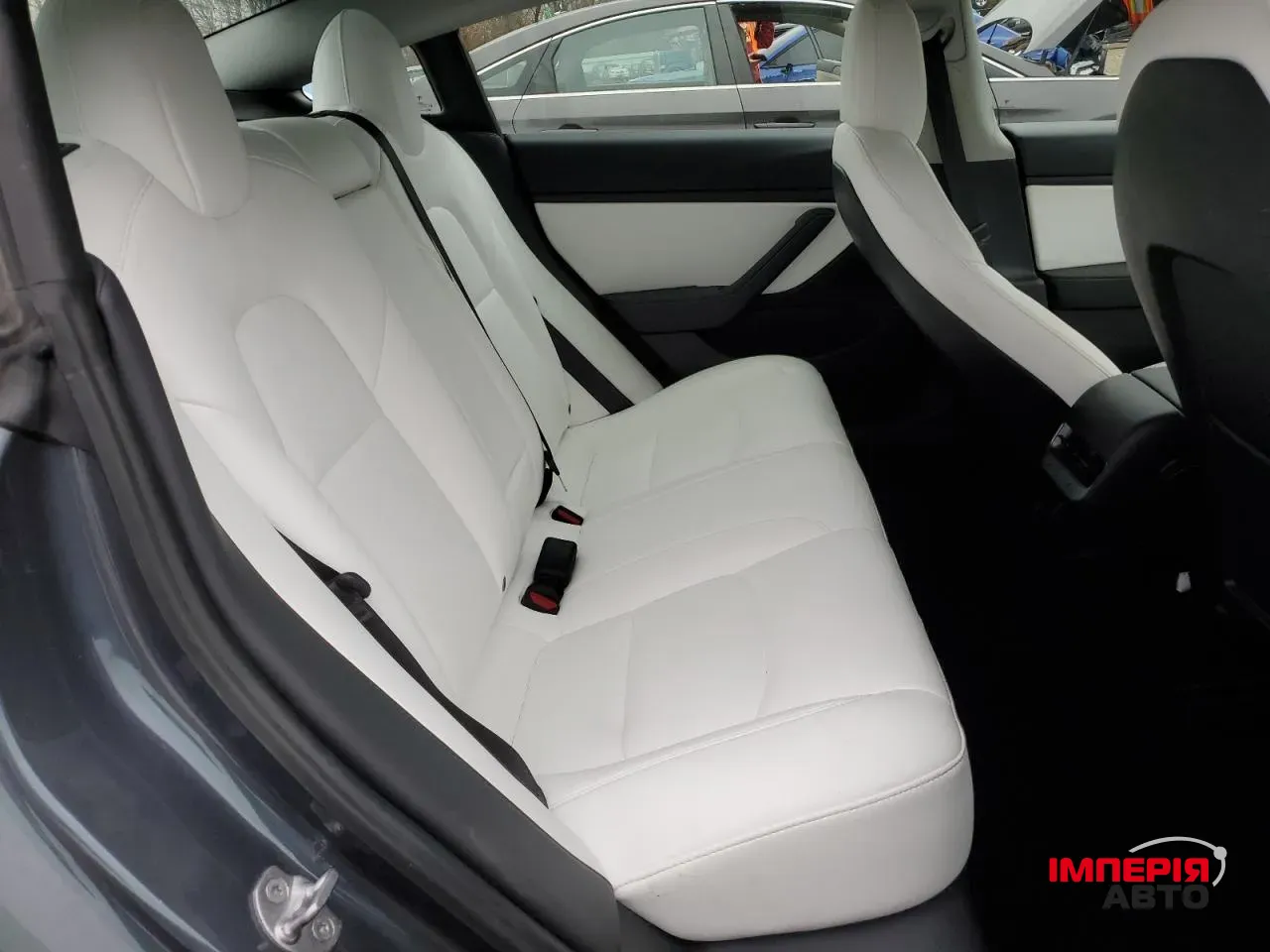 Tesla Model 3 - фото 10