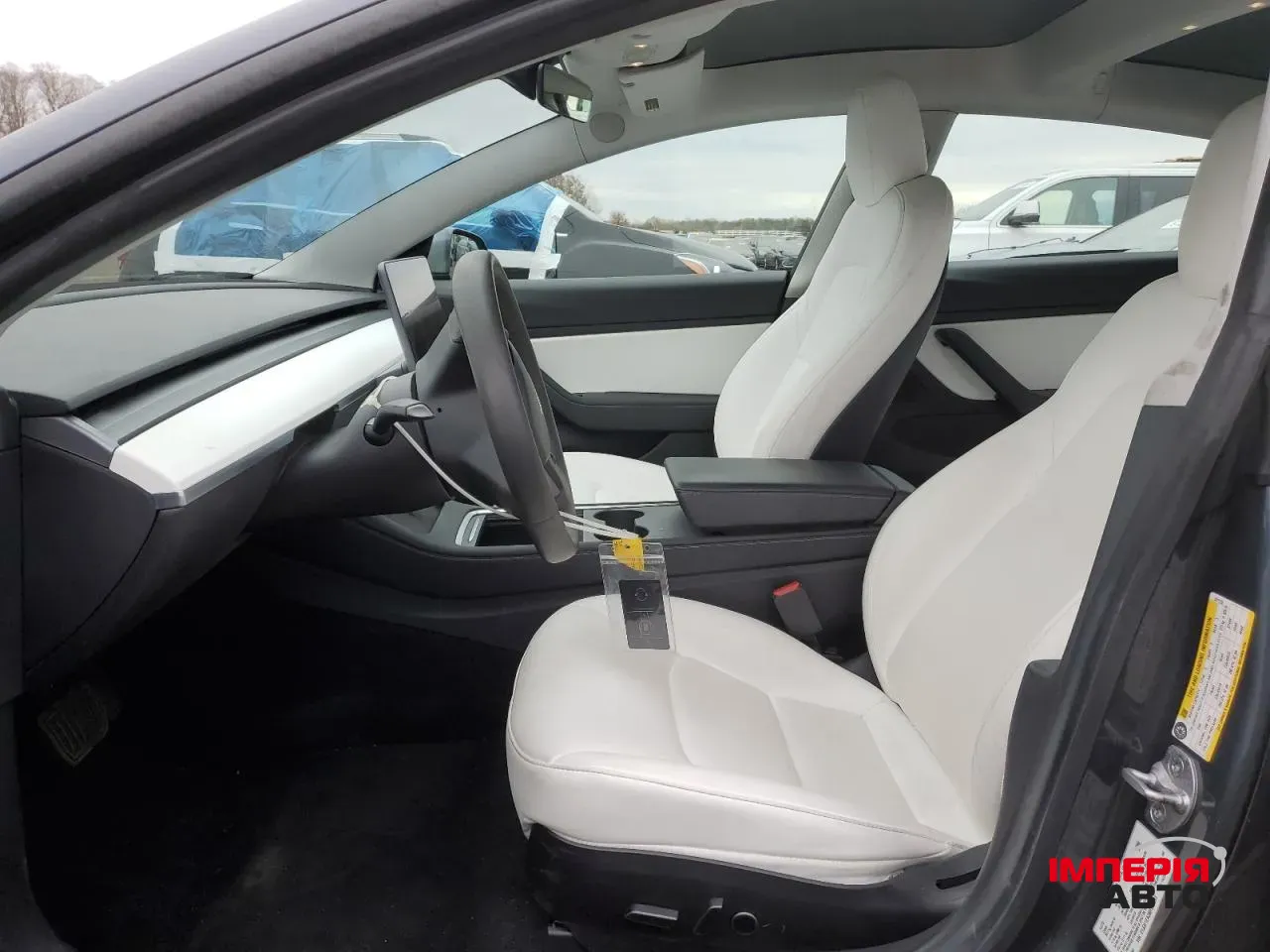 Tesla Model 3 - фото 7