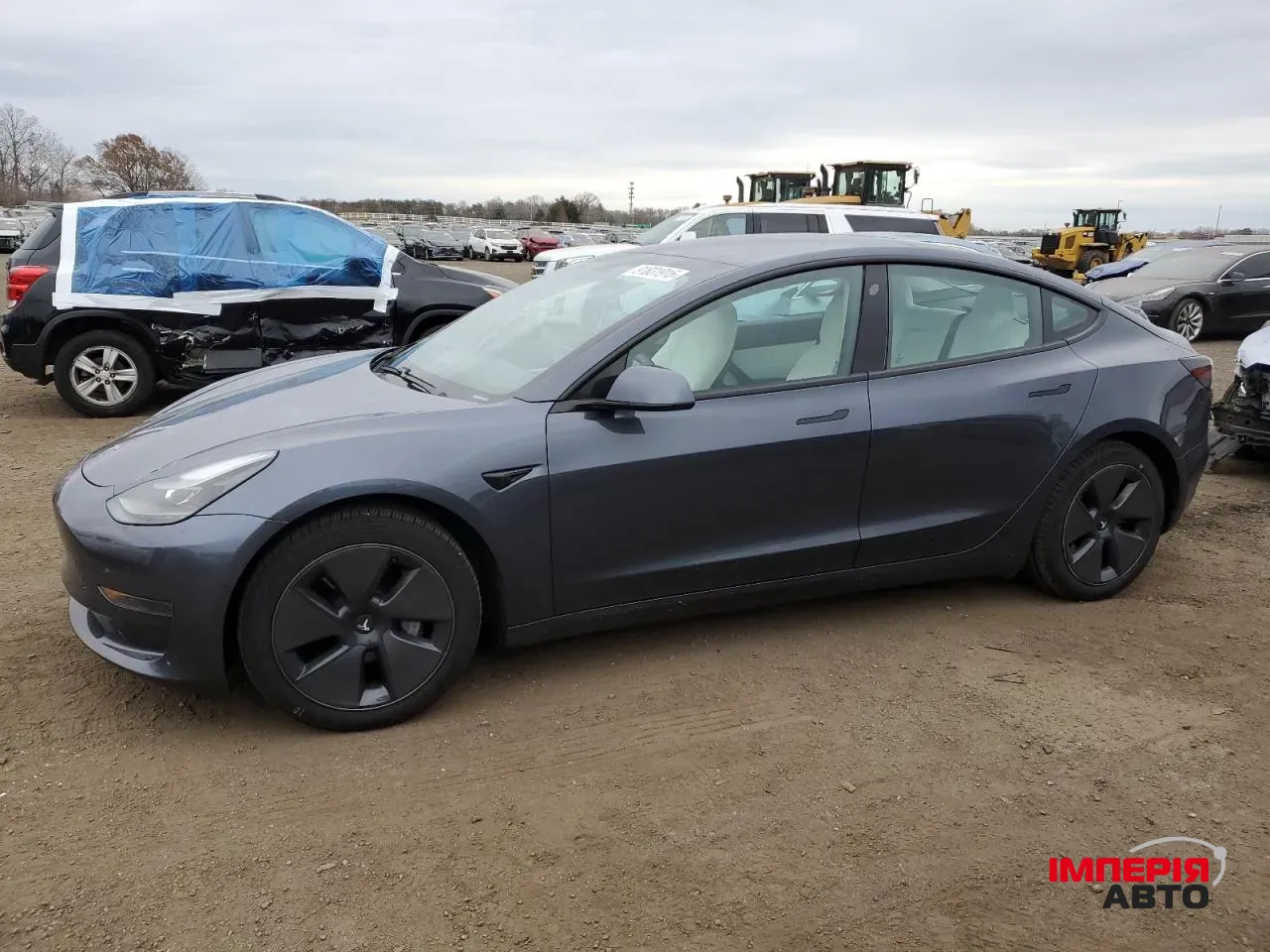 Tesla Model 3 - фото 1