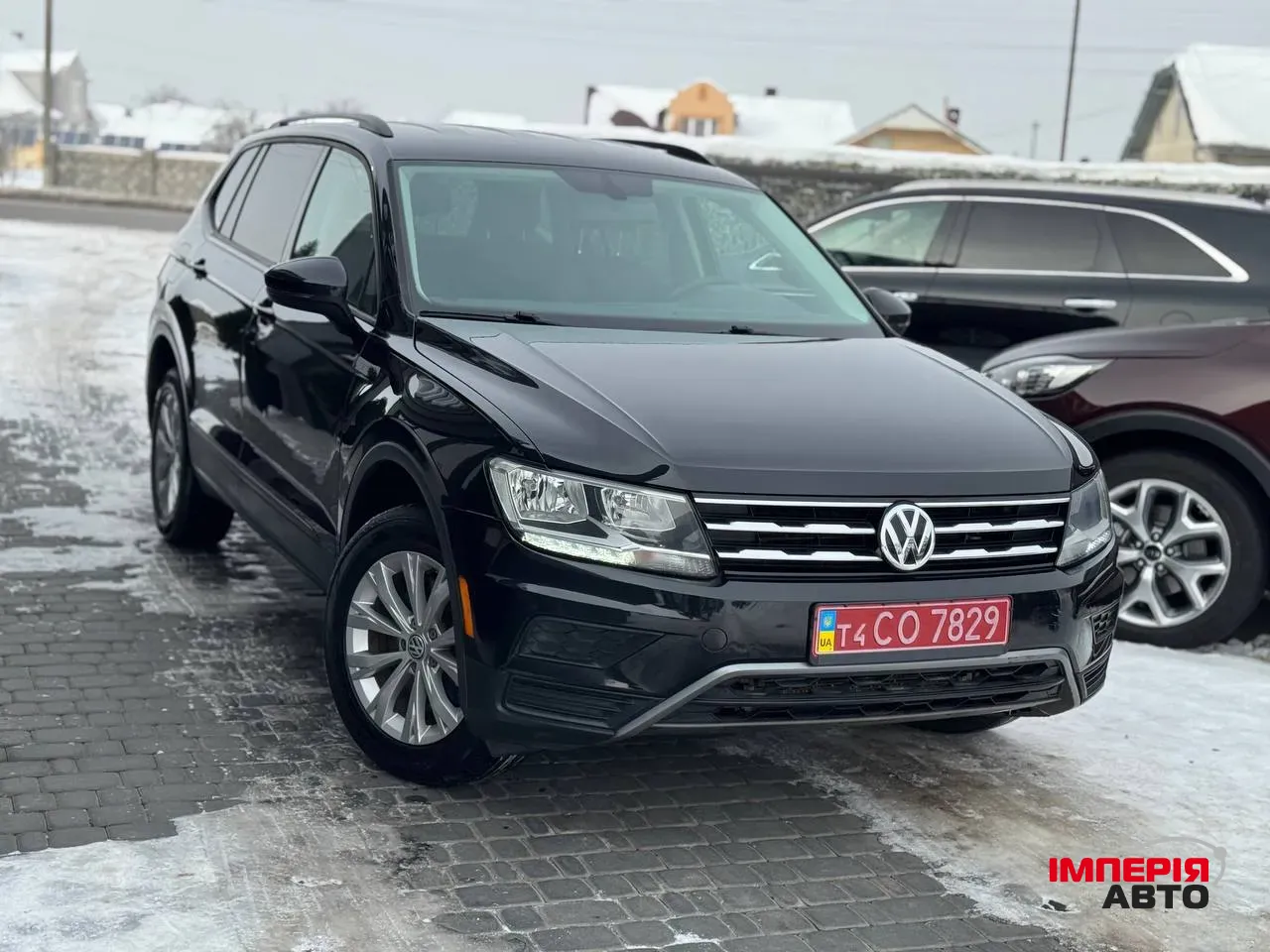 Volkswagen Tiguan - фото 1