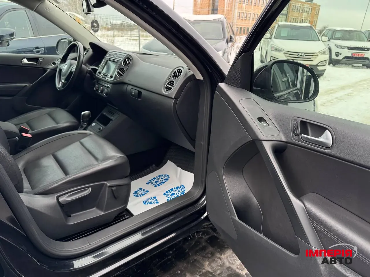 Volkswagen Tiguan - фото 8