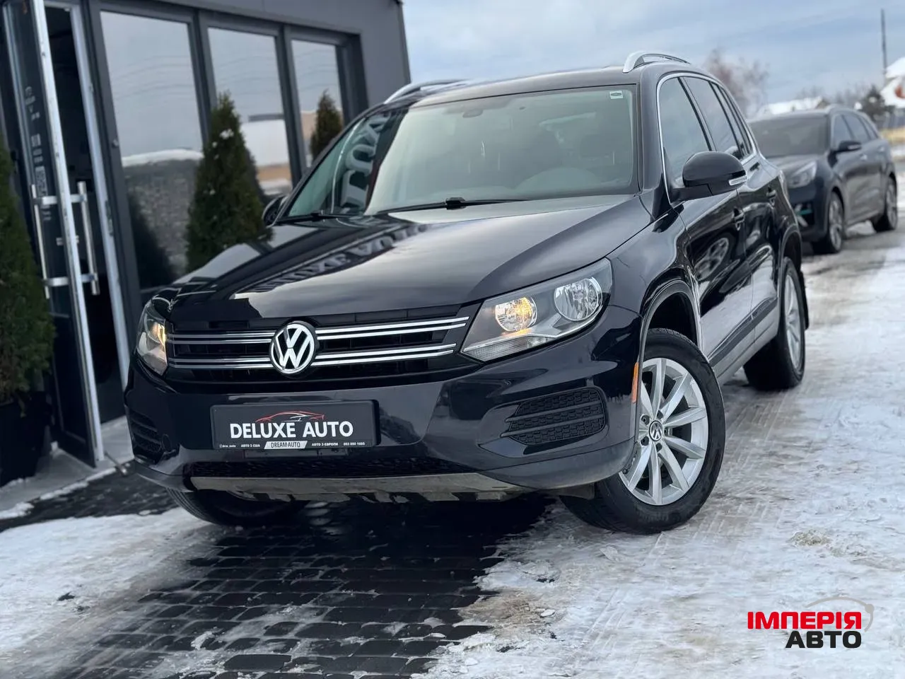 Volkswagen Tiguan - фото 2