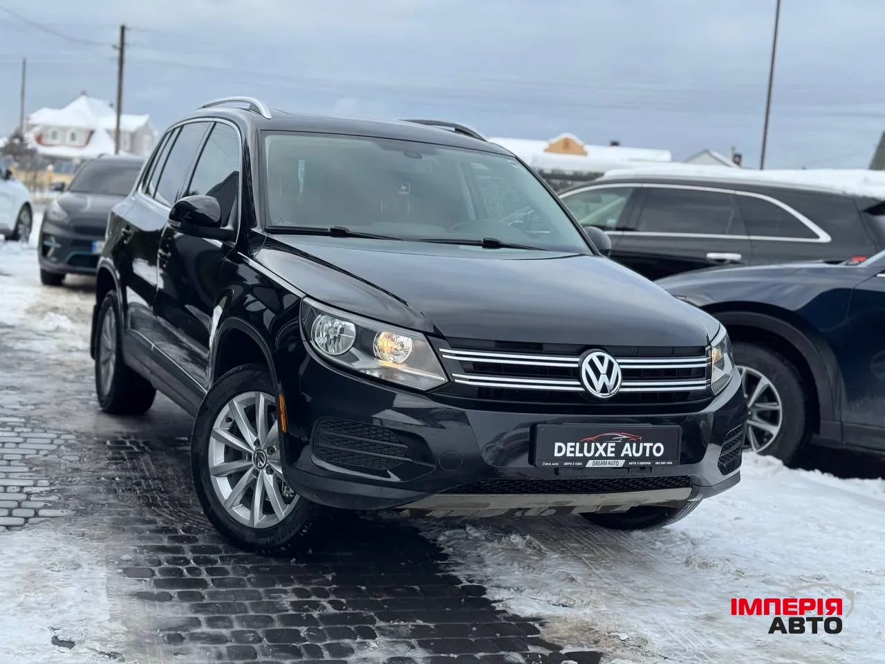 Volkswagen Tiguan - фото 1