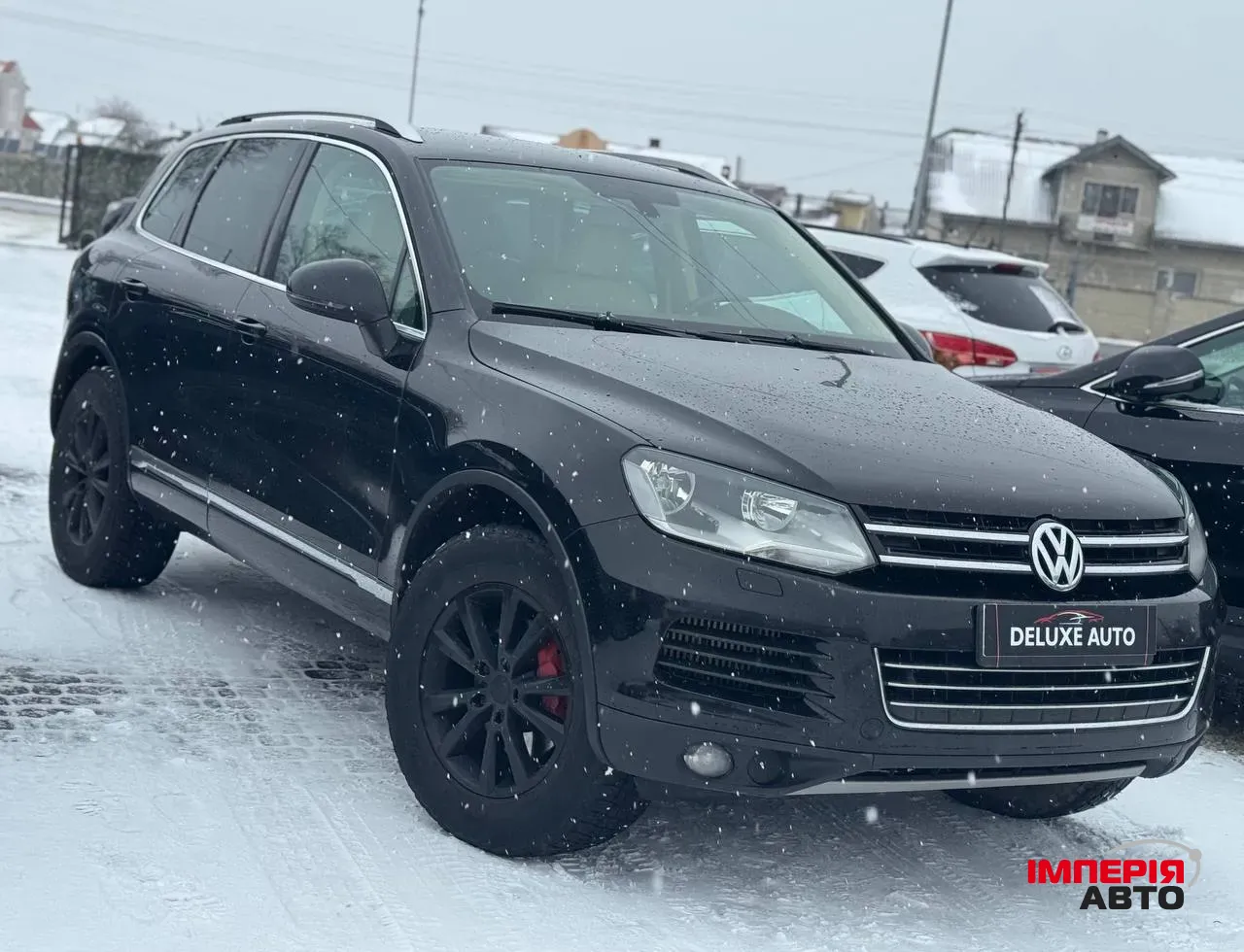 Volkswagen Tiguan - фото 1