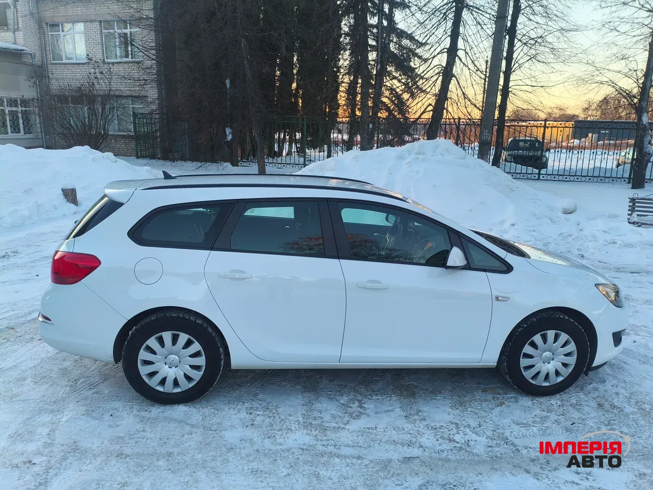 Opel Astra - фото 16