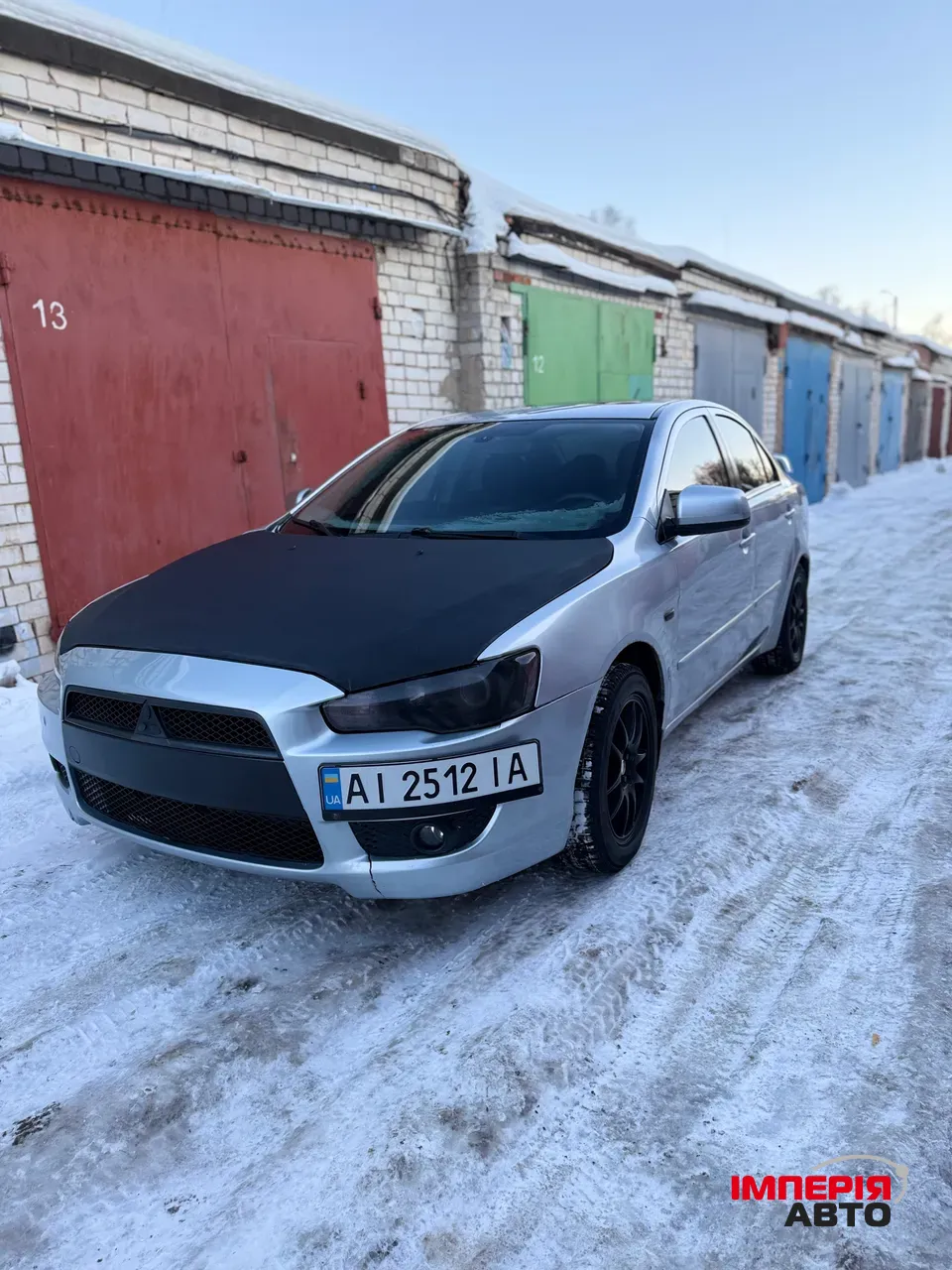 Mitsubishi Lancer - фото 1