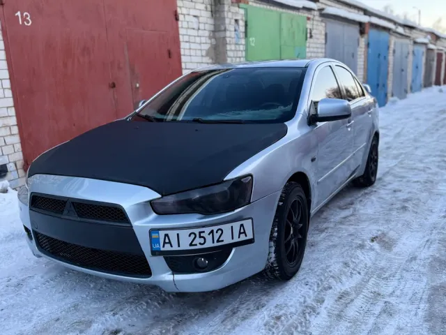 Mitsubishi Lancer - фото 1
