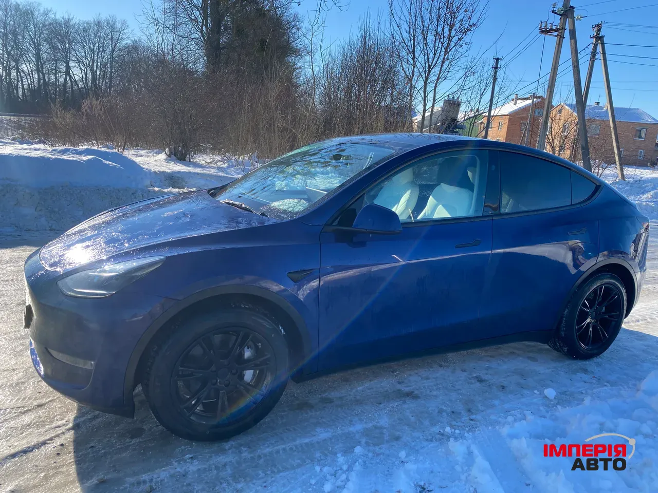 Tesla Model Y - фото 10