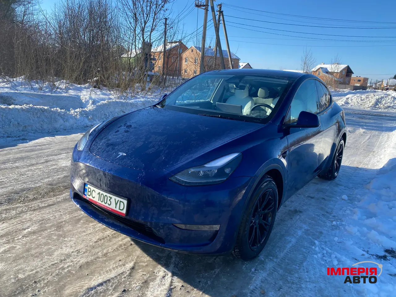 Tesla Model Y - фото 11