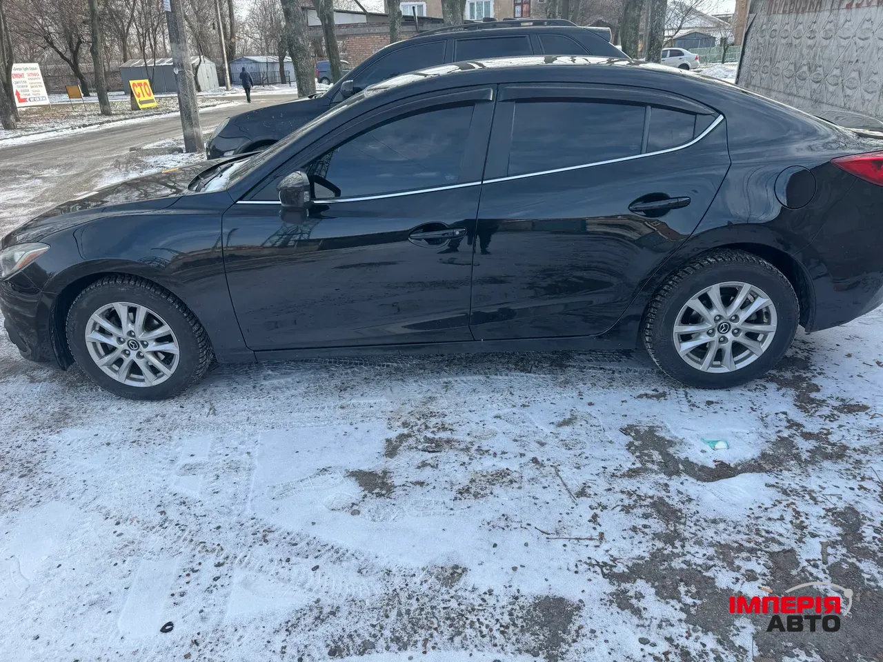 Mazda 3 - фото 7