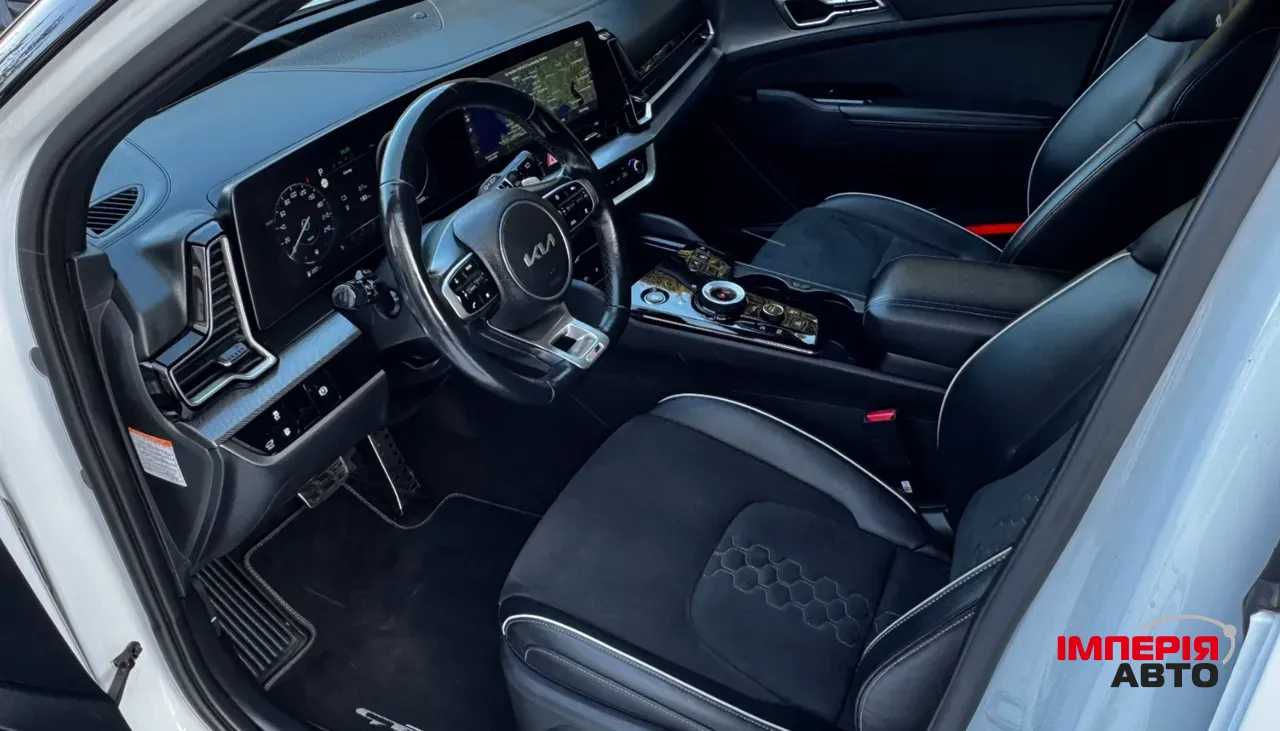 Kia Sportage - фото 12