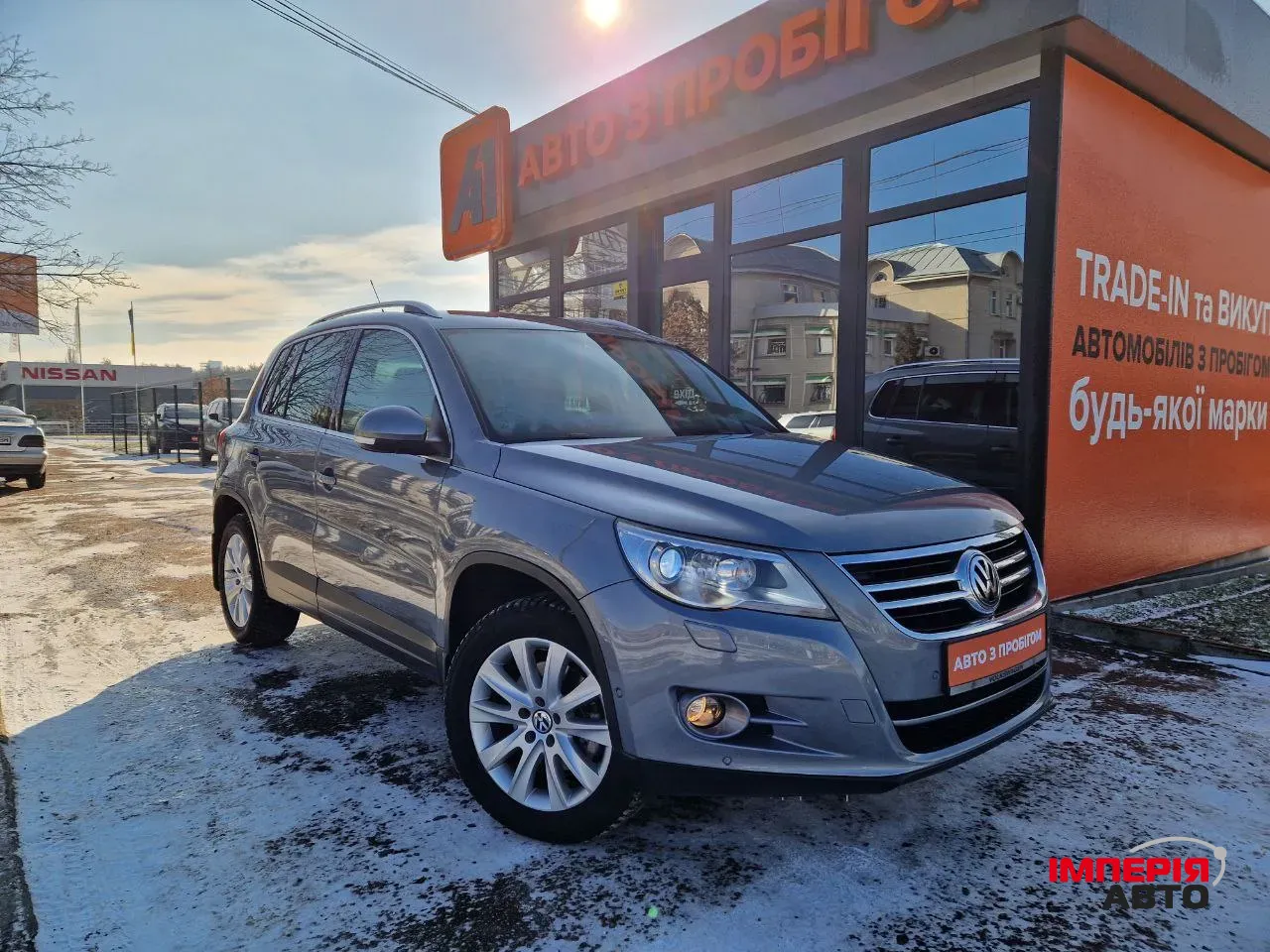 Volkswagen Tiguan - фото 1