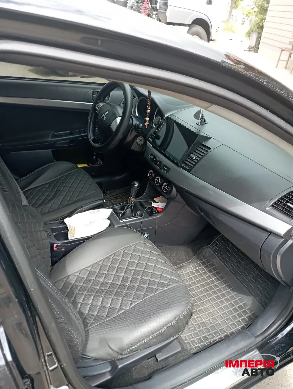 Mitsubishi Lancer - фото 8