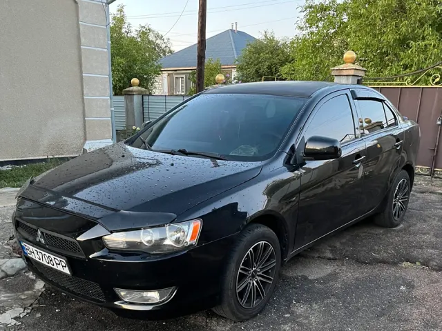 Mitsubishi Lancer - фото 1