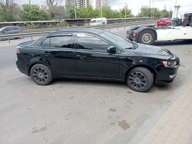 Mitsubishi Lancer - фото 5