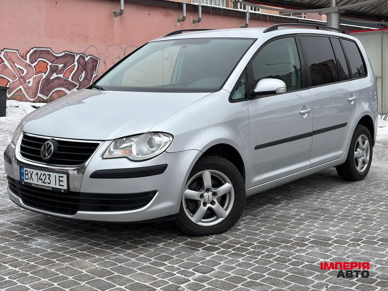 Volkswagen Touran - фото 1