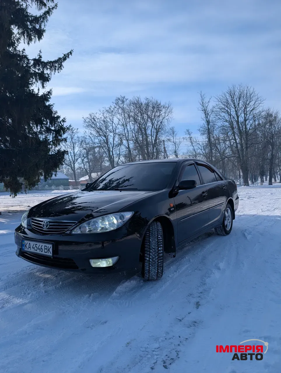 Toyota Camry - фото 1