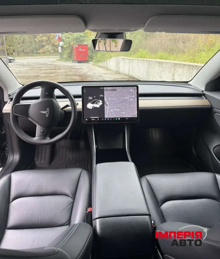 Tesla Model 3 - фото 10