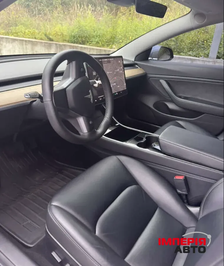 Tesla Model 3 - фото 9