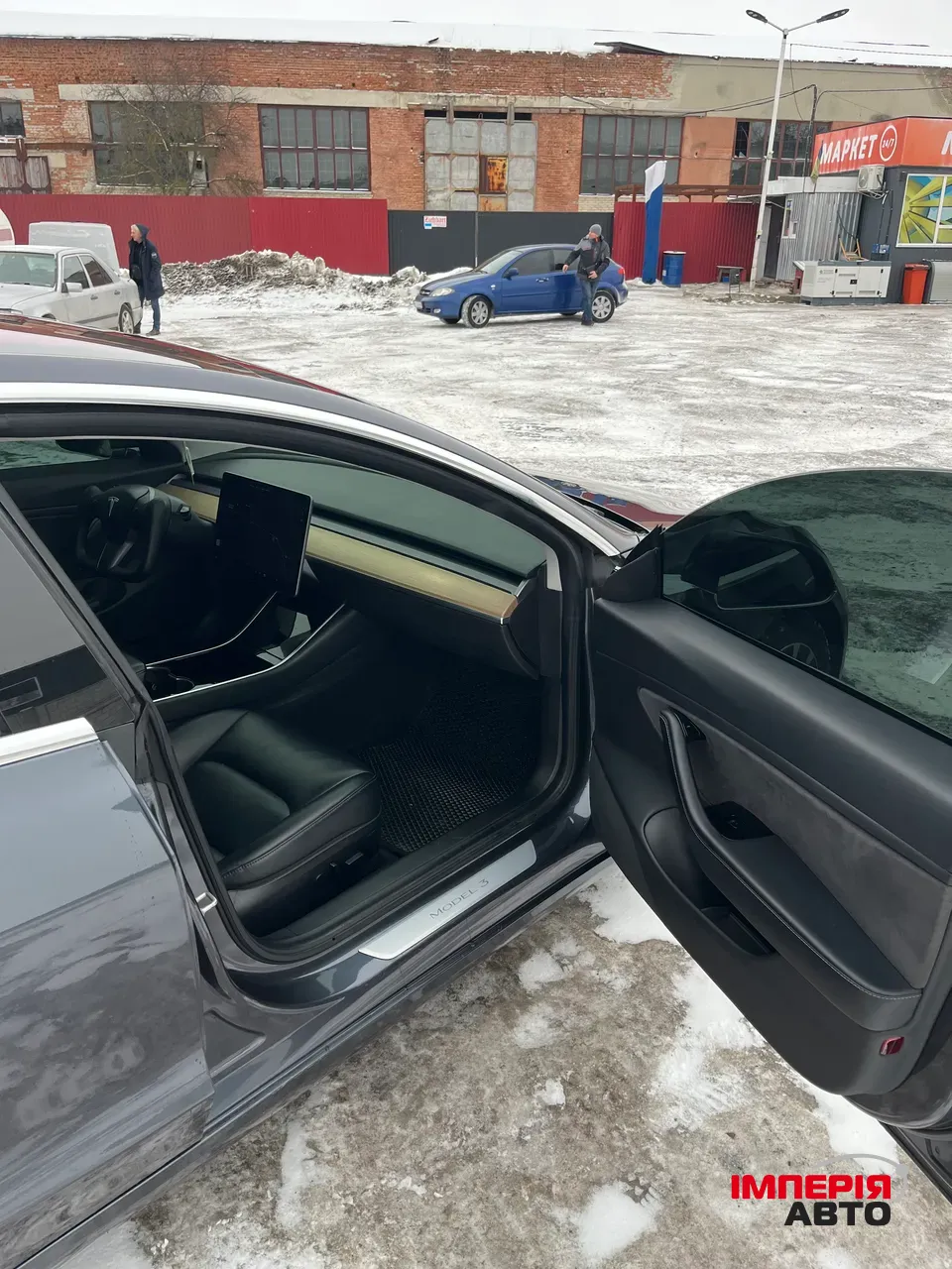 Tesla Model 3 - фото 12