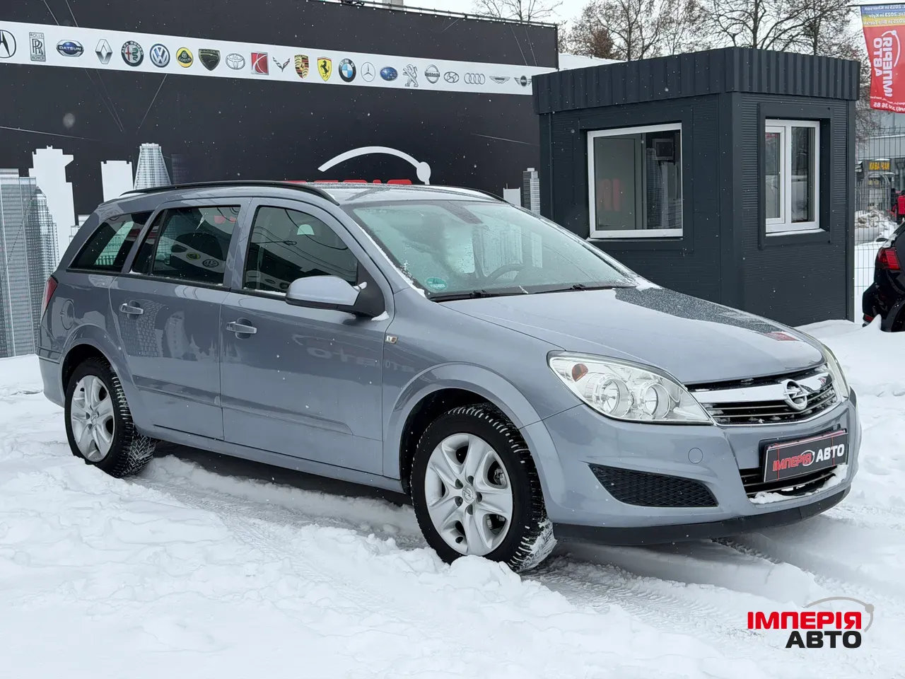 Opel Astra - фото 1