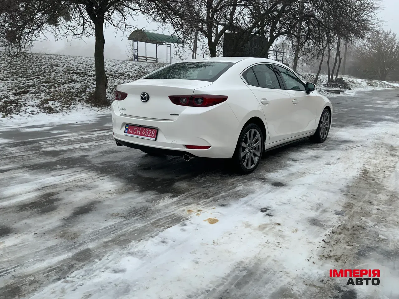 Mazda 3 - фото 10