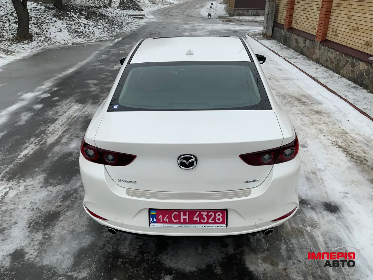 Mazda 3 - фото 11