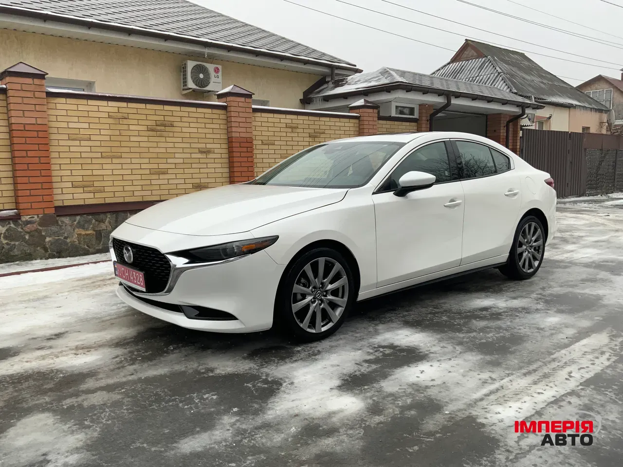 Mazda 3 - фото 1