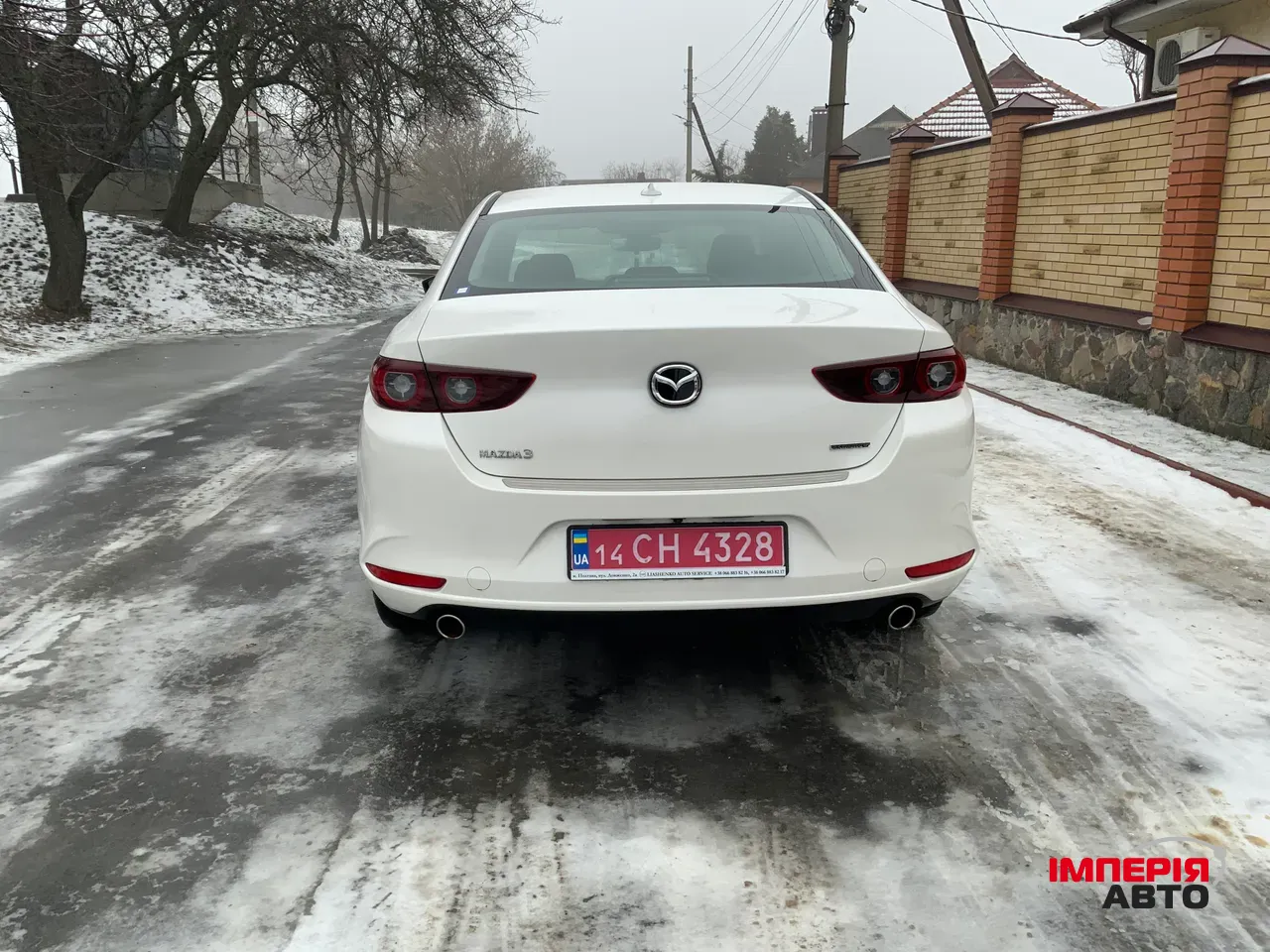 Mazda 3 - фото 8