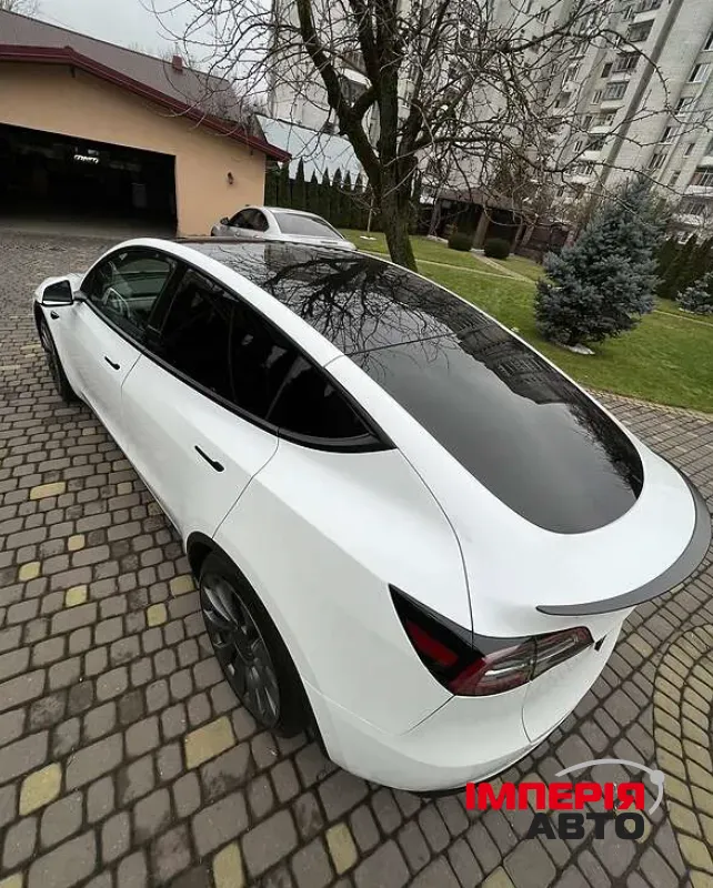 Tesla Model Y - фото 8