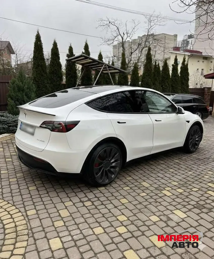 Tesla Model Y - фото 12