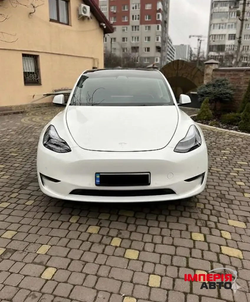 Tesla Model Y - фото 11
