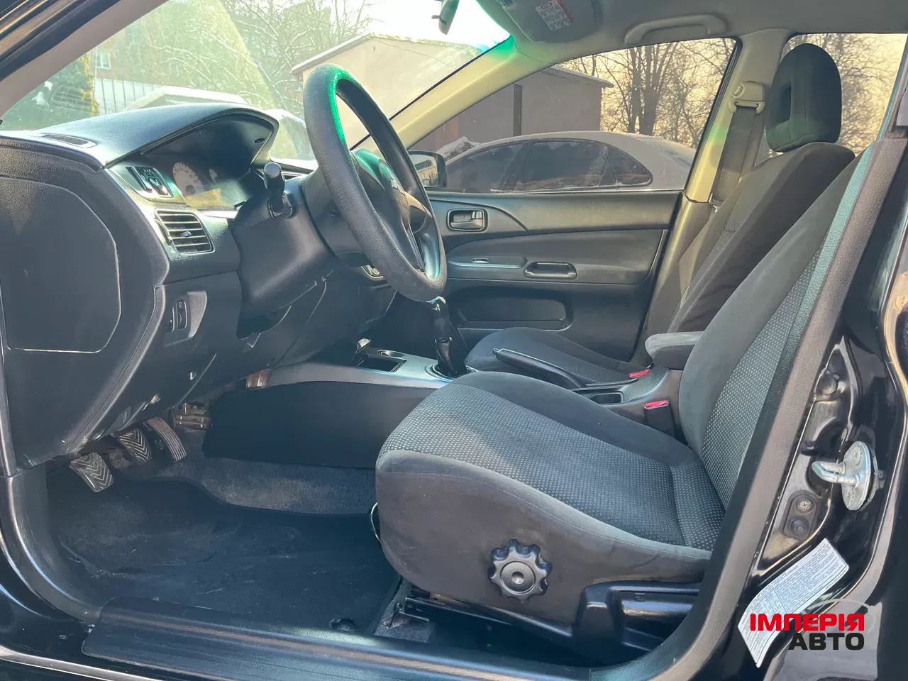 Mitsubishi Lancer - фото 6