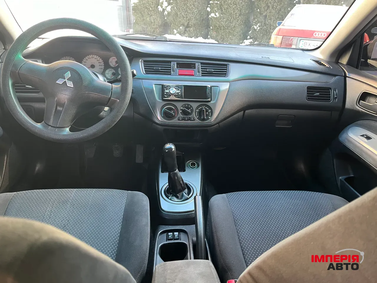 Mitsubishi Lancer - фото 7