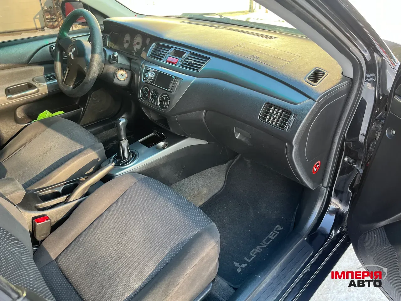 Mitsubishi Lancer - фото 5