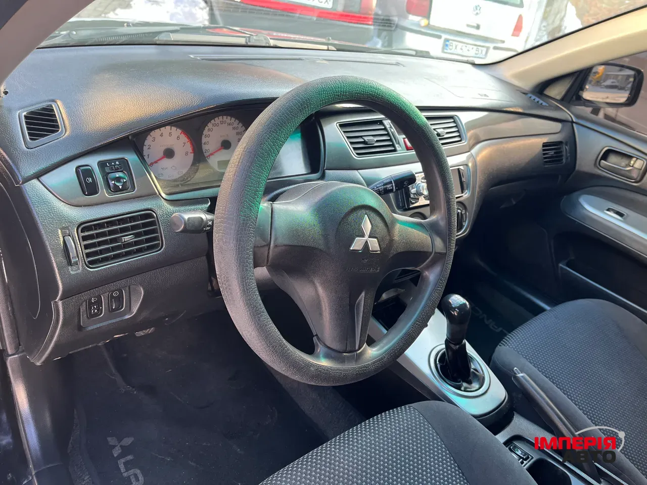 Mitsubishi Lancer - фото 8