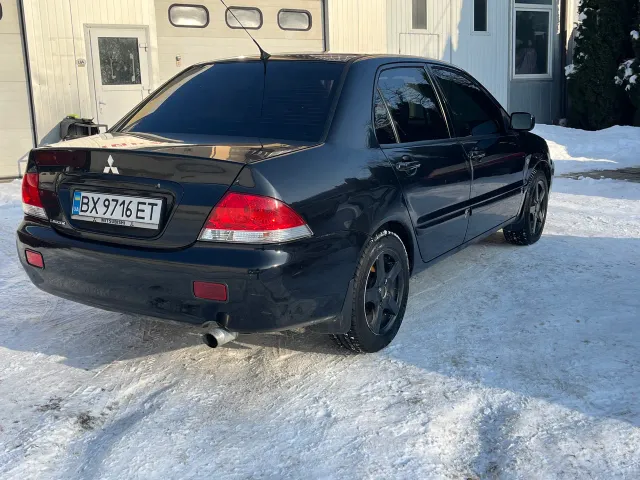 Mitsubishi Lancer - фото 3